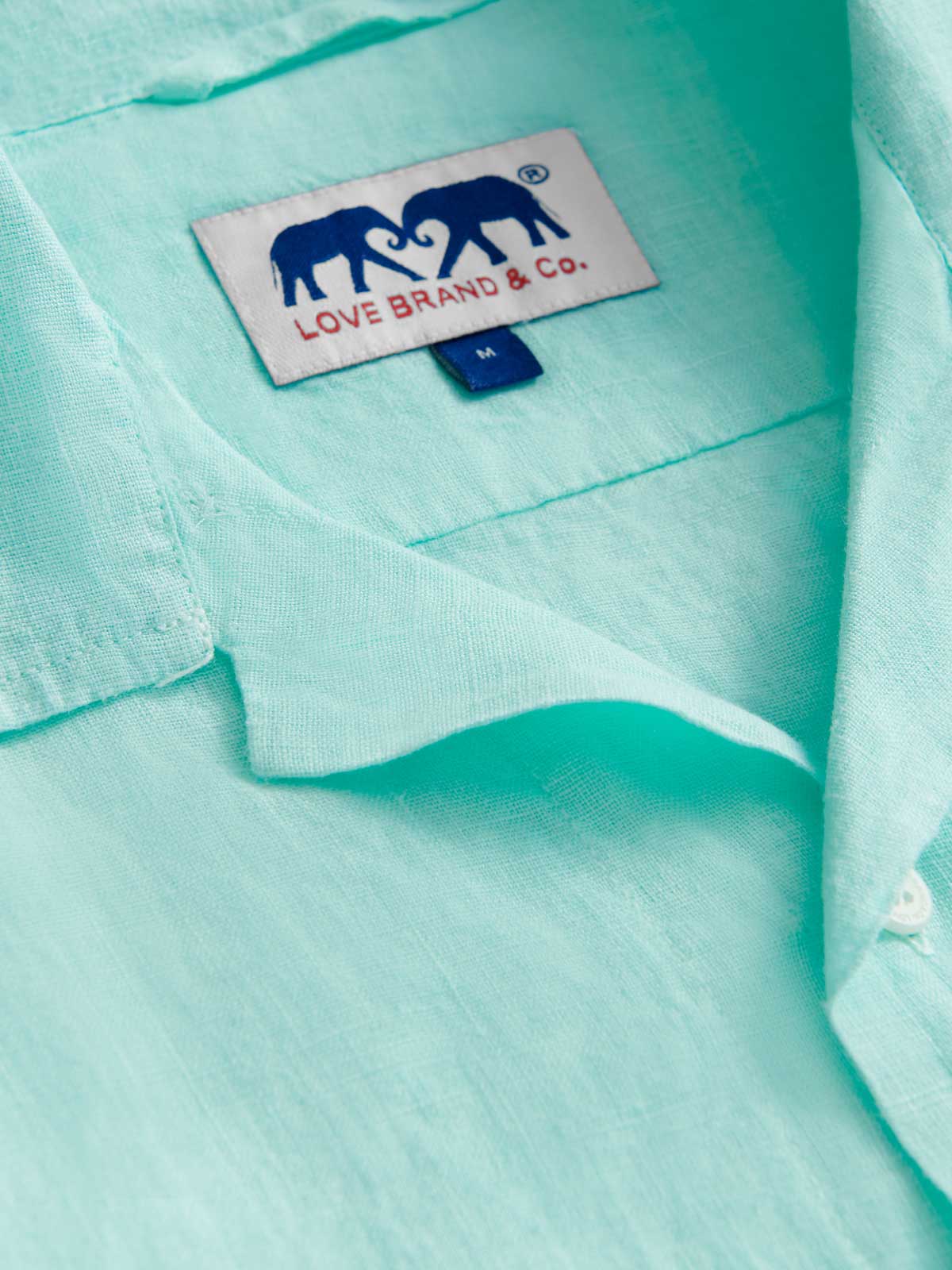 Close-up view of  Men's Cay Green Arawak Linen Shirt.
